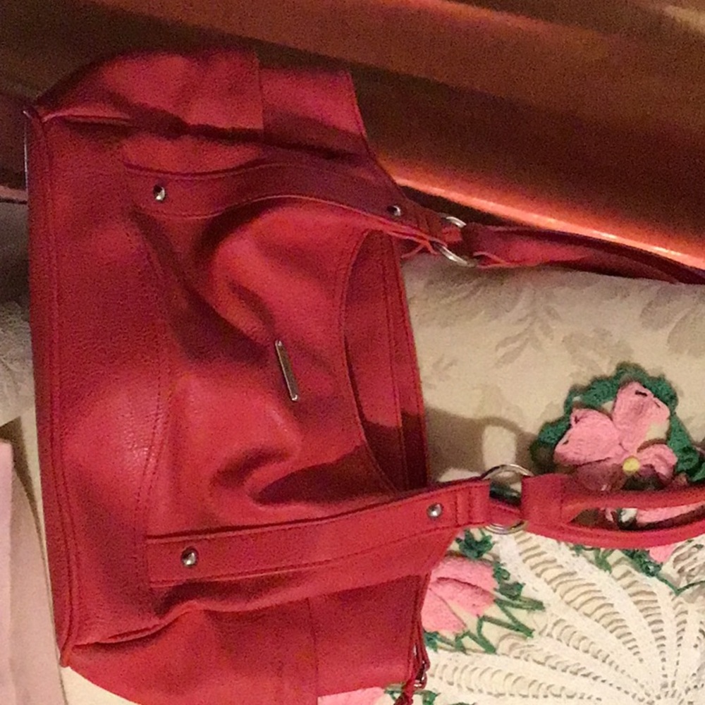 Red purse with  pockets inside and out